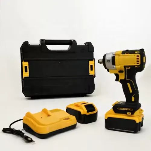 Portable lithium-ion impact wrench with two batteries and a charger